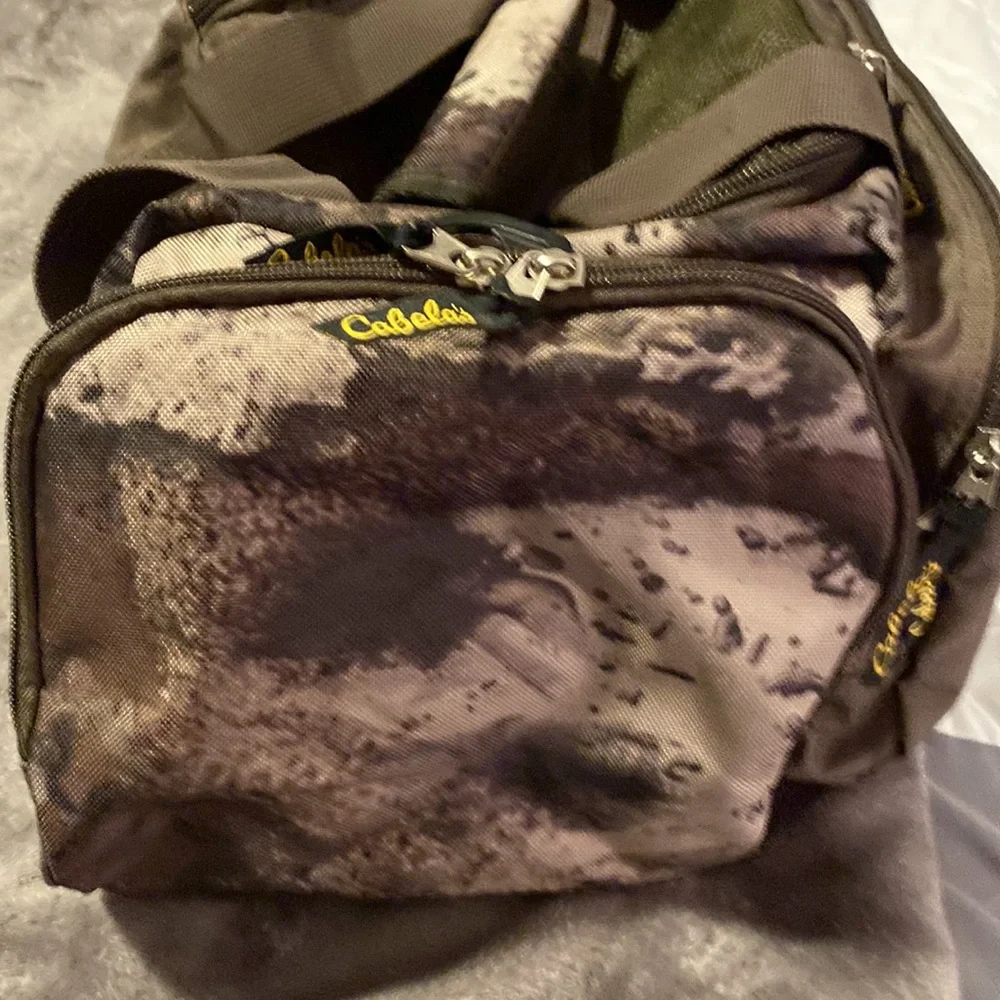- Cabela’s camp duffle bag